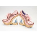 A pair of Disney Cinderella pink metallic lace-up shoes with pink voile ribbon lace-ups, size 39.