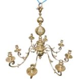 A 19th century brass eight branch chandelier, of detachable form (all arms come off), with hanging
