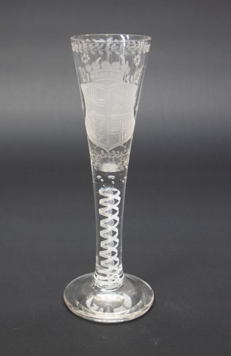 Large fluted cordial glass with a opaque twist stem, bouquet and coat of arms etched detail 19th