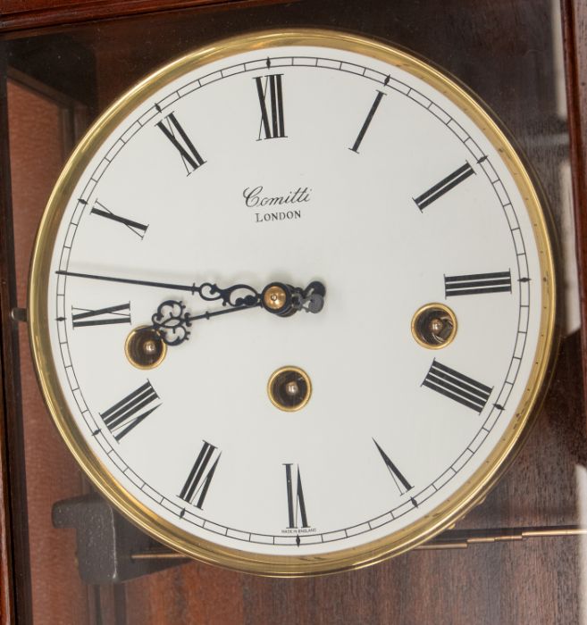 A small collection of clocks to include; a modern Comitti of London wooden cased wall clock with - Image 2 of 4