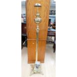 A tall late 19th/early 20th century brass Corinthian column lamp, converted from oil to electric,