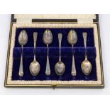 A matched set of six George V silver tea spoons, each terminal engraved with crossed guns,