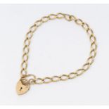 A 9ct gold link bracelet with padlock clasp, width approx 5mm, length approx 20cm, weight approx