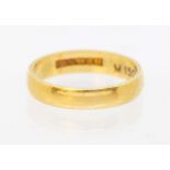 An 18ct gold wedding band, width approx 4mm, size L1/2, weight approx 3gms  wear and tera