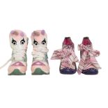 High-fronted lace-up shoes by Irregular Choice in Barbie pink, black and white striped design.