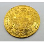 An Austrian gold one ducat, dated 1915.