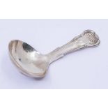 A Victorian silver fiddle and shell pattern caddy spoon, plain bowl, hallmarked by Yapp &