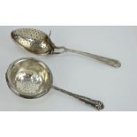 A George V silver tea infuser hallmarked  Birmingham 1930 and a silver tea strainer (A/F) hallmarked