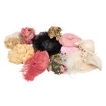 Another collection of vintage hats: a large black spotted tulle picture hat; a cream satin