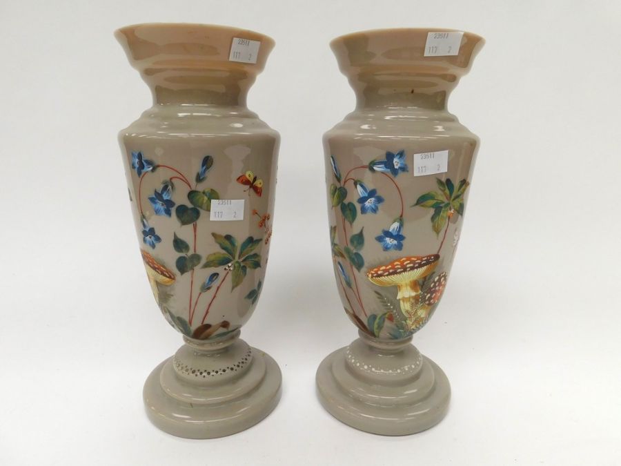 A pair of early 20th Century vaseline glass hand painted vases