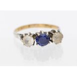 A 9ct gold three stone ring, comprising blue and white stones, platinum setting, size K1/2, total