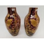 Pair of 19th Century French enameled glass vases, attributed to legras with gilt enameled detail
