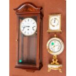 A small collection of clocks to include; a modern Comitti of London wooden cased wall clock with