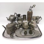 A collection of pewter wares, to include tea sets, tray, pots etc