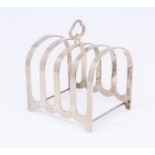 A George VI silver five bar toast rack with clover leaf type loop handle, hallmarked by Charles S