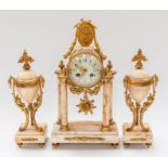 An early to mid 20th century ormolu style clock garniture consisting elaborate brass cased marble