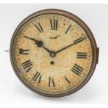 A large brass 19th century ship's 8-day clock with Roman numerals and bevelled glass.