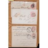 Album containing 60+ Queen Victoria envelopes and postcards of mixed condition, some uncancelled.