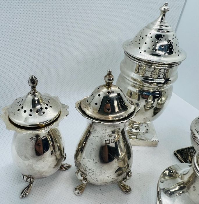 A collection of eight sterling silver pepperettes/casters. Featuring a Viners salt and pepper shaker - Image 3 of 3