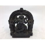 An Indian carved stone figural group. H:10cm