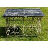 A marble topped iron centre table and daybed