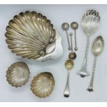 A collection of sterling silver shell items. Featuring a Victorian dog nose termination, twisted