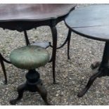 A collection of early 20th cent tables and a 19th cent piano stool