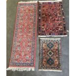 Collection of three rugs to include two Yalameh wool rugs (74cm x 51cm , 83x 55cm), and an Indian