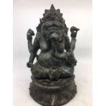 An Indian bronze figure of Ganesh. H:29cm together with smaller.