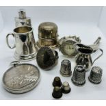 A collection of silver curios. Featuring a ring box, stamped Birks Sterling; a 925 stamped wrist