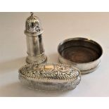 A Georgian style silver sugar caster with pierced cover, turned finial by Baker Ellis silver co,