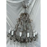 A 20th cent Chandelier with cut glass drops supported on gilt brass frame