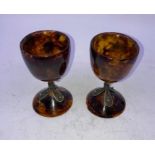 A pair of silver mounted amber goblets , probably Chinese