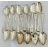 A collection of twelve 18th and 19th century English pattern serving spoons. Makers marks to include