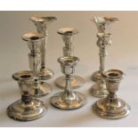 A pair of silver bud vases with shaped rims, circular bases, Birmingham 1976, 15cm high, a pair of