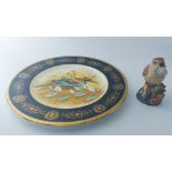 A Coalport artist's sample plate painted with a bee-eater by R. Blyth within a black and gilt