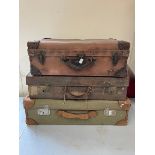 three suitcases, ideal storage 2 possibly leather/leather effect one in the ex military green.  (3)