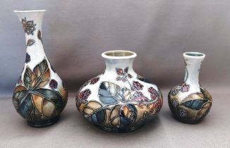 A trio of Moorcroft Blackberry Bramble pattern C1994 ,possibly Sally Tuffin vases, decorated with