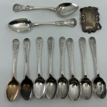 A set of eight Edwardian bright cut silver teaspoons, a pair of silver teaspoons, Edinburgh 1853 and