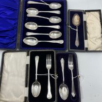 A set of six Edwardian Old English pattern teaspoons, London 1902, an Edwardian child's silver spoon
