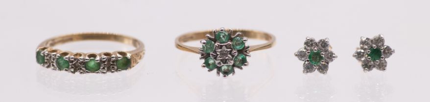 A collection of 9ct gold and emerald jewellery. Comprising an emerald and diamond half hoop ring,