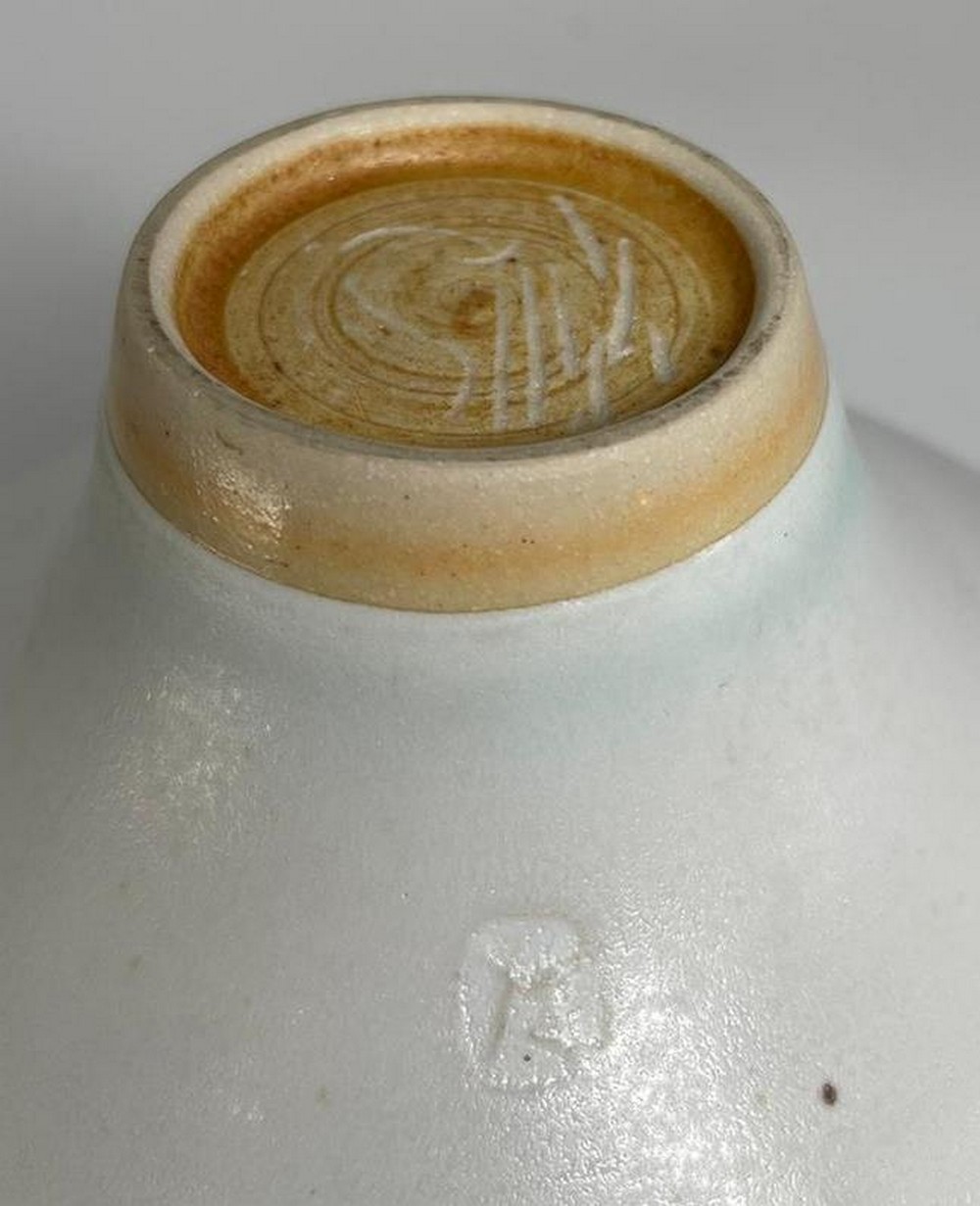 A porcelain footed bowl after Lucie Rie with bronzed decoration to rim.   Impressed mark A. ( - Image 3 of 6