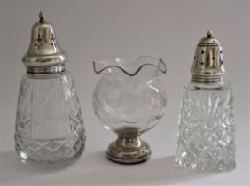 A cut glass sugar sifter with silver collar and pierced silver cover, Birmingham 1941, 16cm high