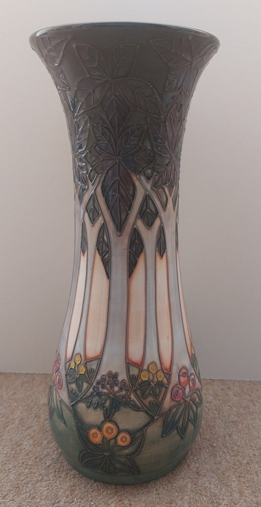 A tall tube lined stylised Moorcroft vase, decorated with a continuous band of woodland trees with - Image 4 of 7