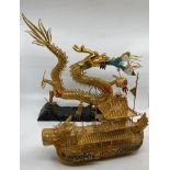 Ornamental Chinese Silver and gilt and enamel Golden Dragon and spirit junk boat on stands.   Dragon