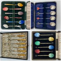 A harlequin set of six silver and enamel bean end coffee spoons, Birmingham 1948, a similar set, 925