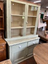 Pale green painted farmhouse style cupboard. in two parts  Approximately  6'8H x 4'2 w