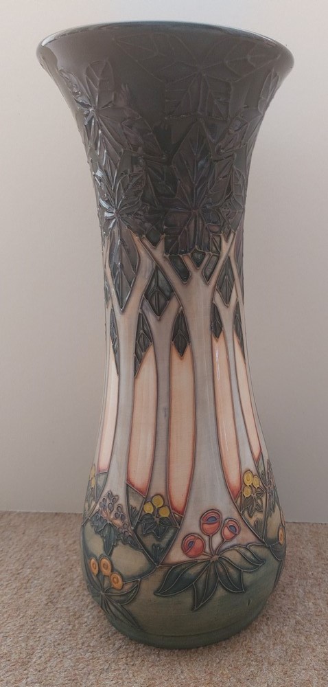 A tall tube lined stylised Moorcroft vase, decorated with a continuous band of woodland trees with - Image 2 of 7