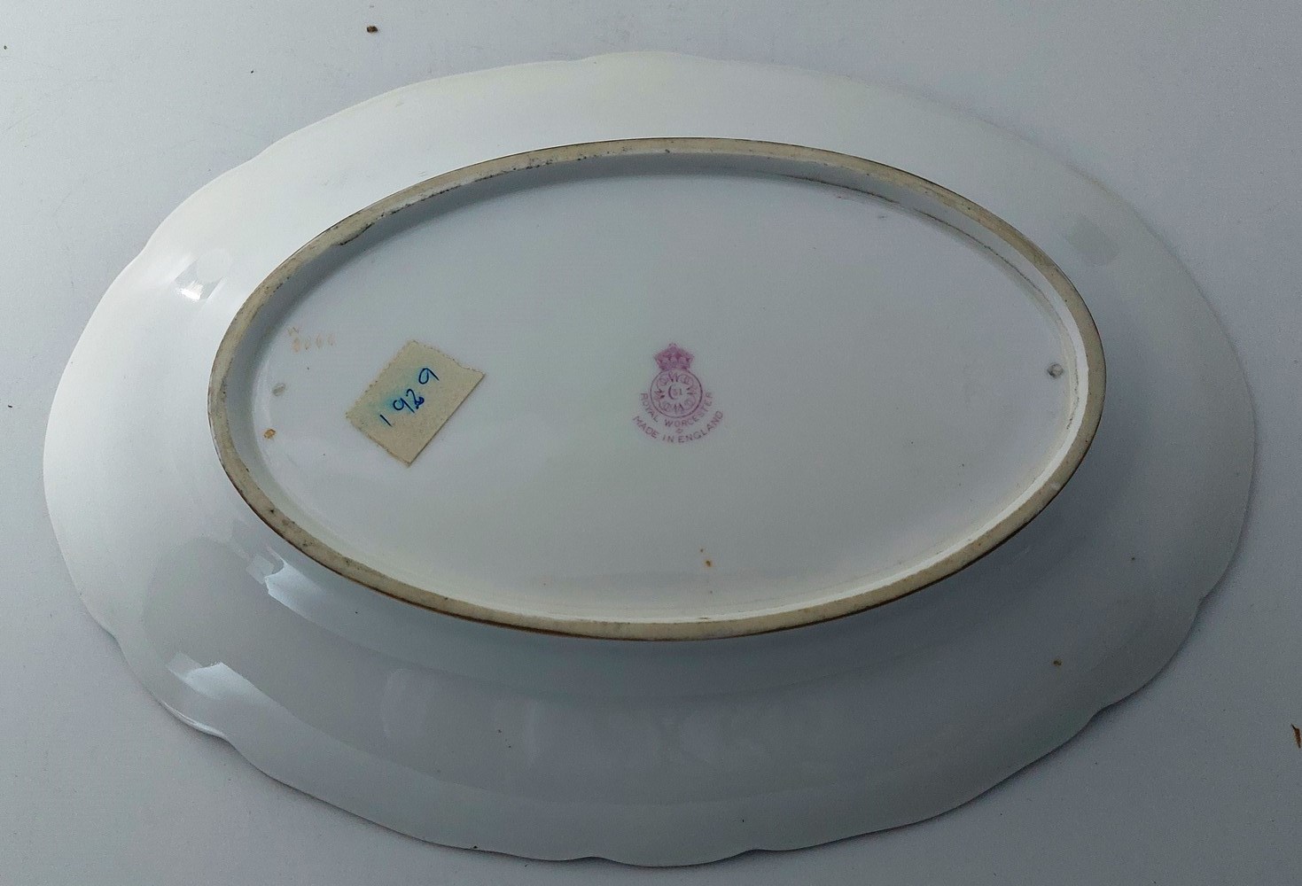 A Royal Worcester oval dish, c1900, painted with pears and grapes by R. Seabright within a peach and - Image 2 of 3