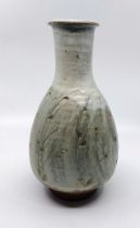 A Phil Rogers (1951-2020) Stoneware vase.  In a pale green and off white  glaze. With an impressed